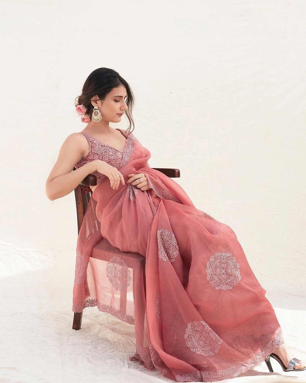If you're someone who loves carrying a saree on every occasion, a printed saree with subtle designs is a perfect fit to amp up the look. Fatima Sana Shaikh in this Pink printed saree gives us the major festive goals. Girls looking for inspiration for a cocktail party can copy her style. 