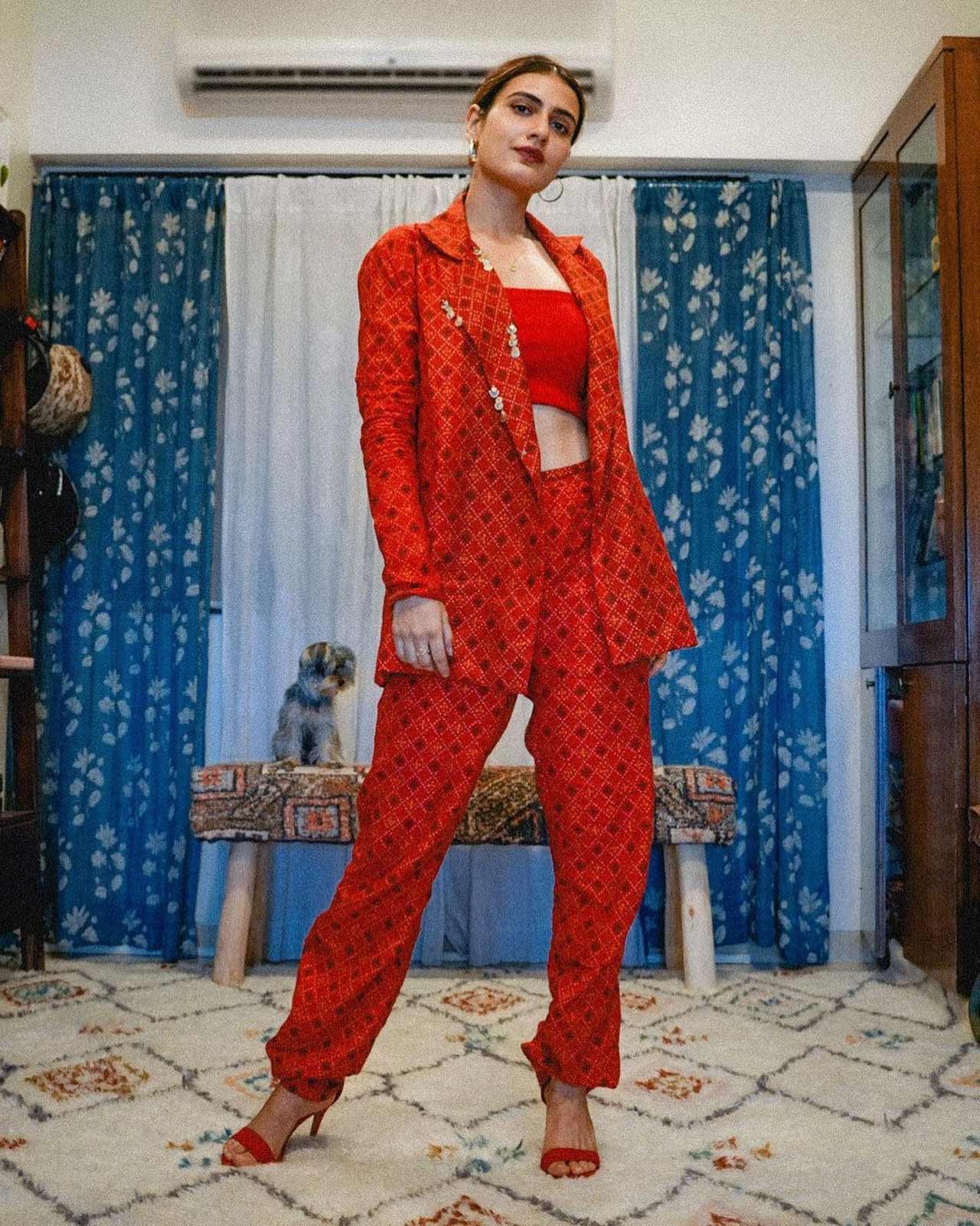 If you're thinking of trying a uniquely cool yet traditional look for a festive season, you can opt for a Pant-Suit with minimal makeup and jewellery. Raise the oomph just like Fatima with this red ensemble paired with matching footwear and a simple pair of earrings. 