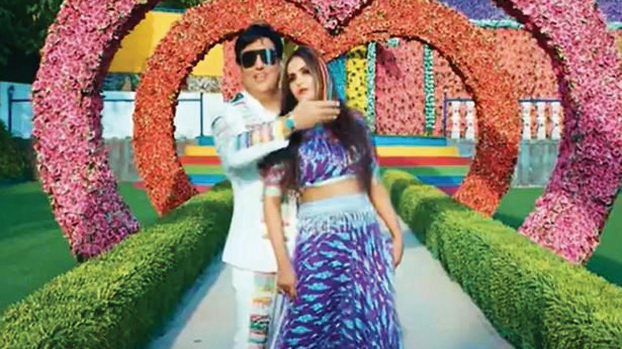 Govinda with Nisha Sharma