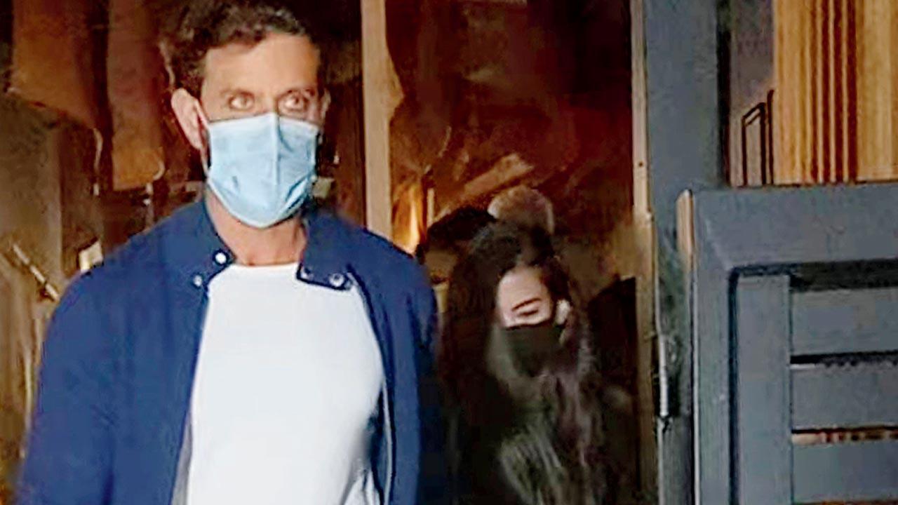 On Friday night, Hrithik Roshan stepped out for a meal at a Japanese restaurant in Bandra. While exiting the place, the star was seen holding the hand of a girl and escorting her to his car. Turns out she is Mujhse Fraaandship Karoge (2011) actor Saba Azad who is also a musician. Read full story here