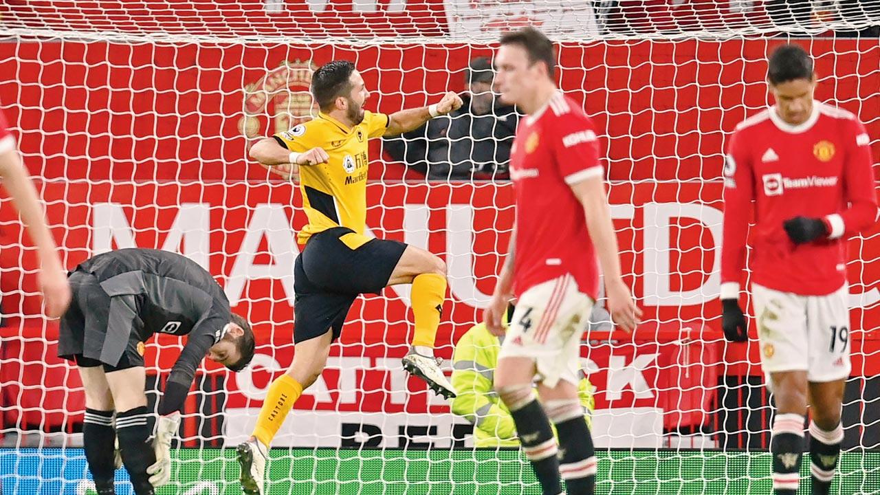 Wolves’ Joao Moutinho (2nd from left) celebrates after scoring against Manchester United. Pic/AFP