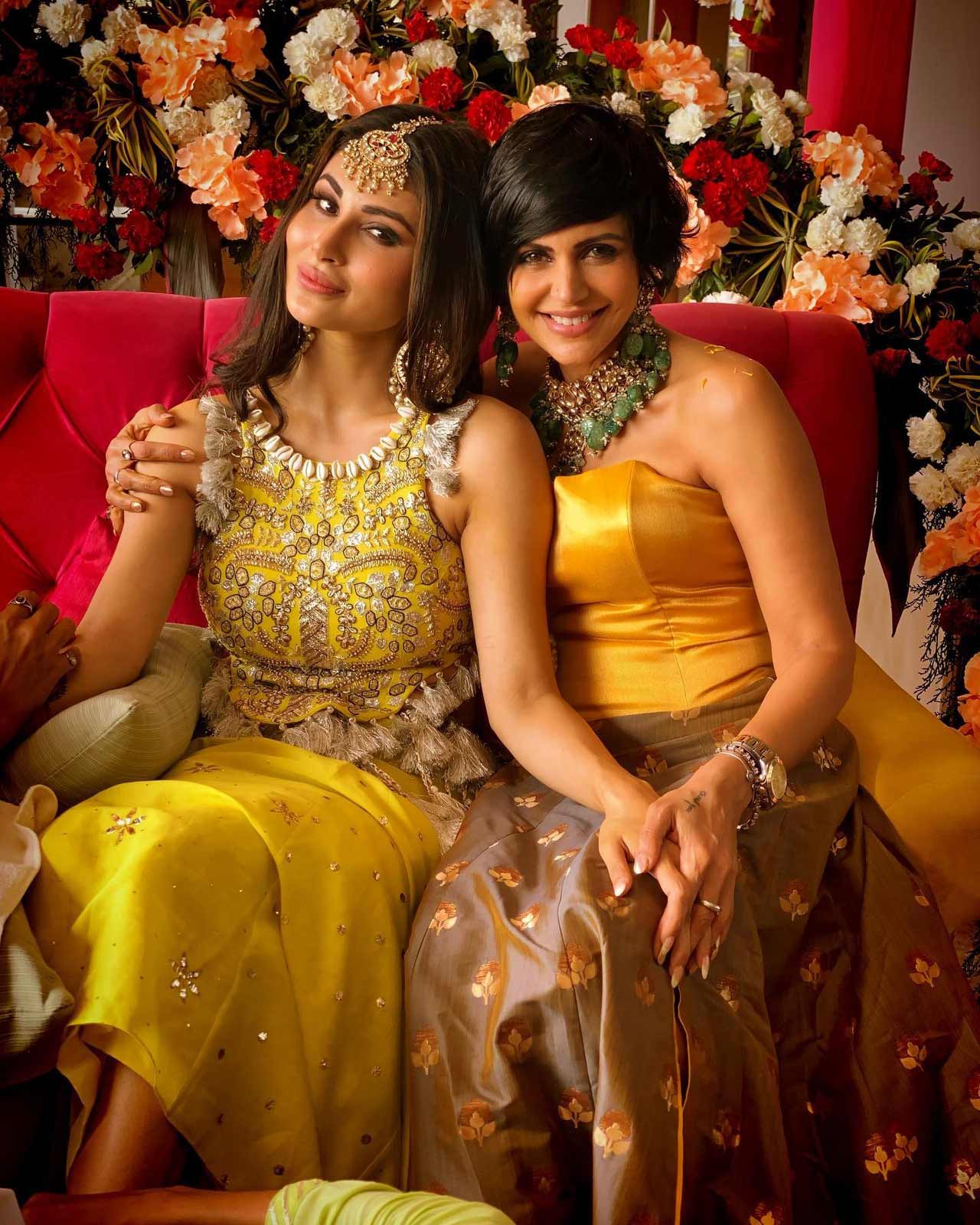 The bride-to-be was seen in a stunning yellow traditional outfit and Bijlani was donning a white Kurta Pajama with a shimmery brown Nehru jacket and giving a glimpse of the actress' gorgeous Mehendi.