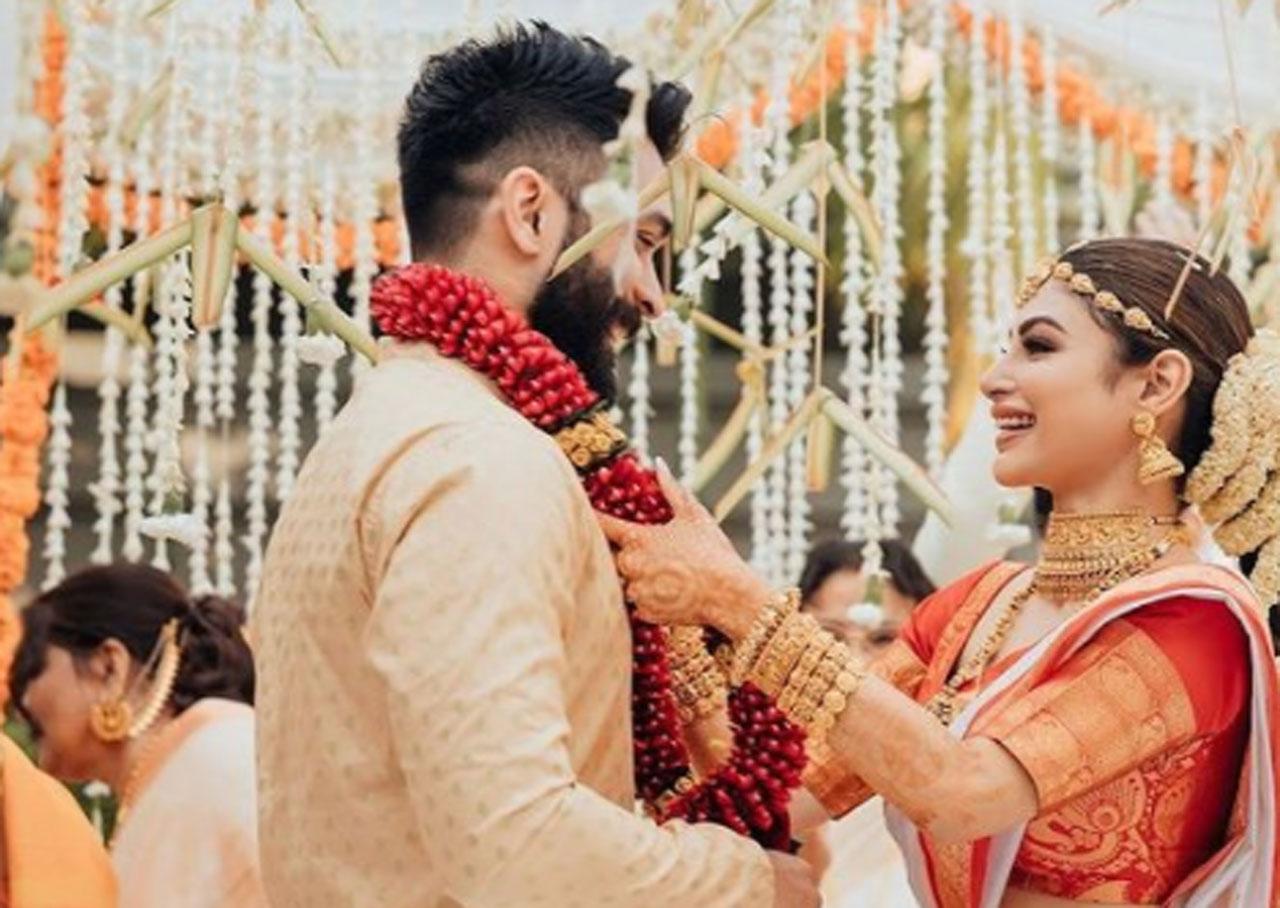Mouni Roy and Suraj Nambiar's dreamy wedding happened in Goa according to the South Indian and Bengali culture, and the bride and the groom aced both the looks with elan. Celebrities have congratulated the couple on the big day of their lives.