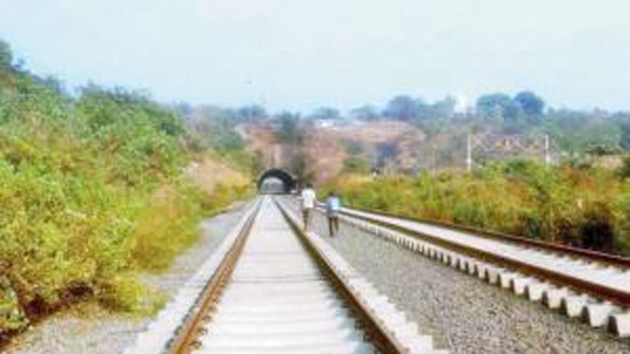 Watch video: Motorman applies brakes, train stops inches away from man lying on tracks
