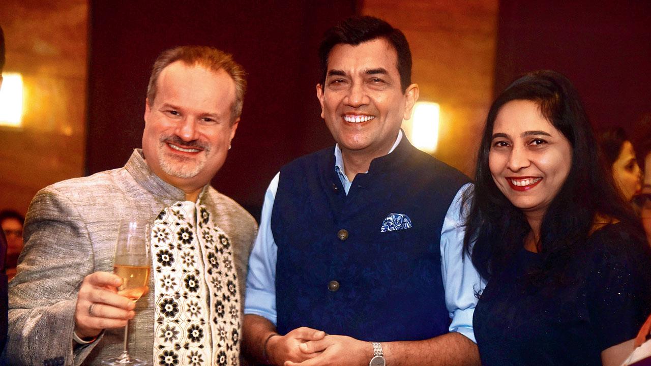 (From left) US Consul General David J Ranz, chef Sanjeev Kapoor and his wife Alyona Kapoor at the celebrations at Grand Hyatt, Santacruz. Pic/Shadab Khan