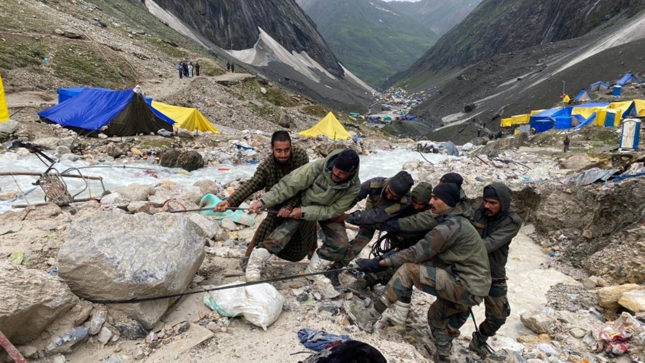 Two Rescue Dog Squads, Through Wall Radar and other specialist detachments have reached Amarnath Cave. Military medical teams are receiving casualties and patients at Nilagrar helipad, the official statement said. Pic/ Defence PRO