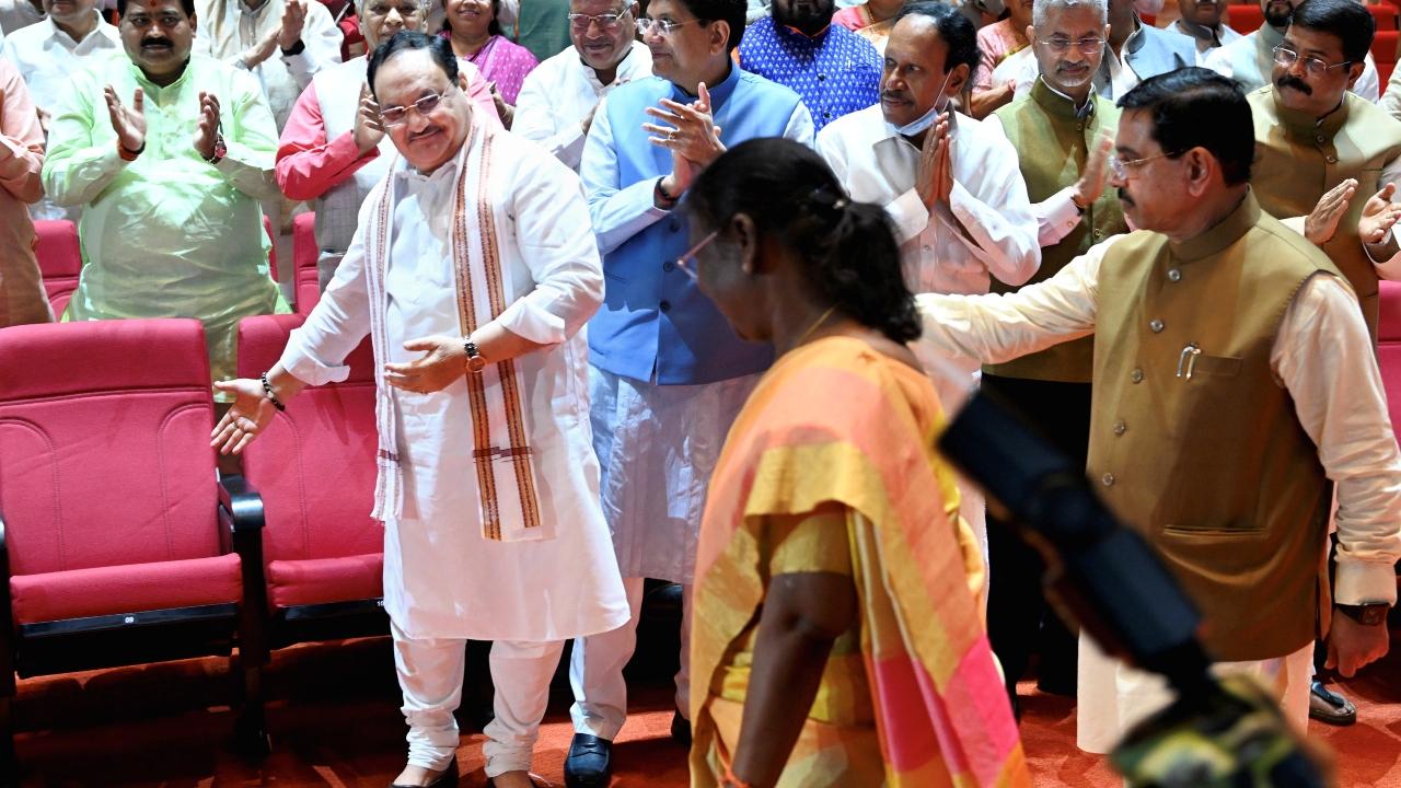 Droupadi Murmu being greeted by BJP National President JP Nadda during the NDA meeting at the Parliament building in New Delhi on July 17, 2022. Pic/PTI