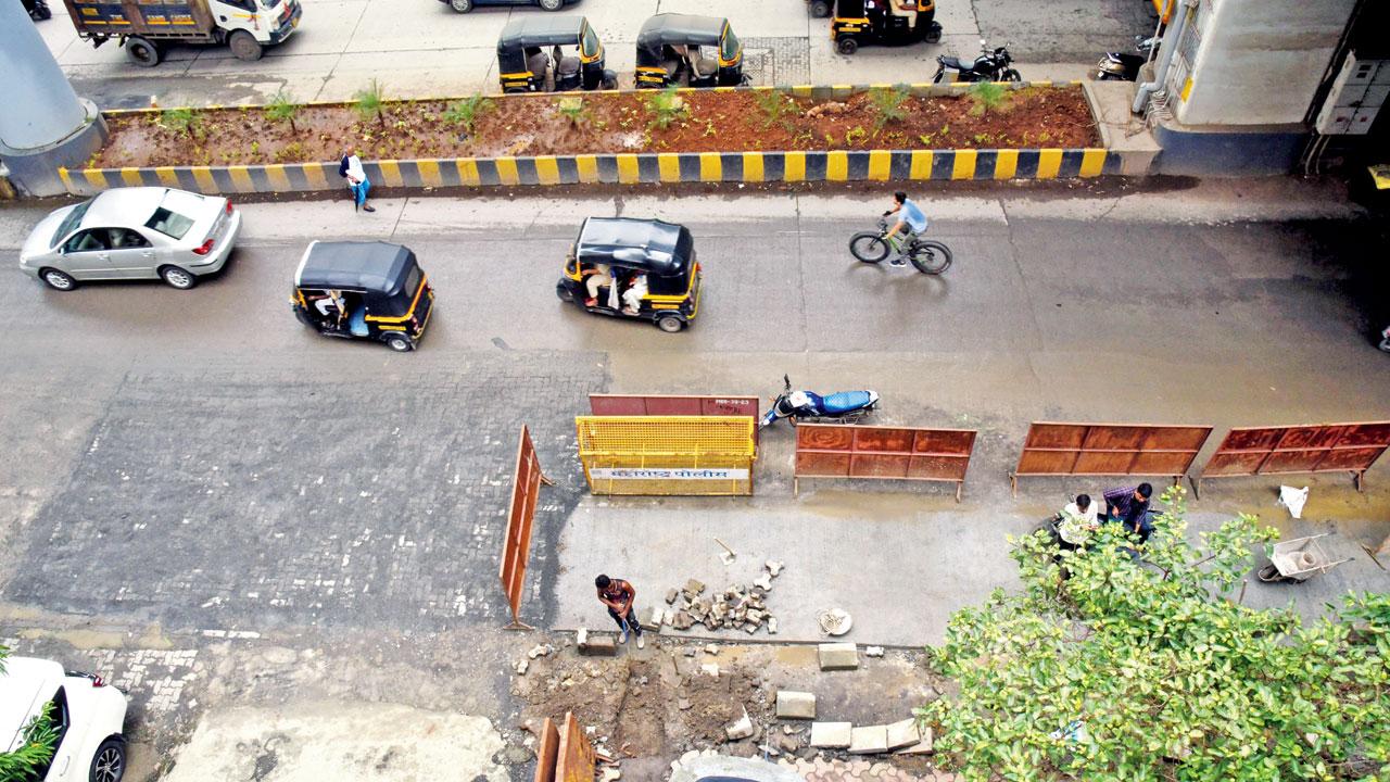 The dangerous stretch on Link Road being levelled on Tuesday. Pic/Nimesh Dave