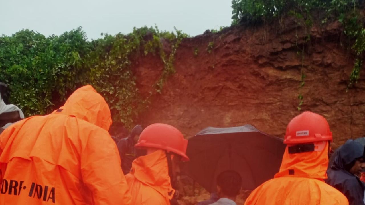 In the first operation, the NDRF personnel responded to the landslide incident in Vasai on Wednesday morning wherein a huge mass of rock and soil landed on a room adjacent to a hill in Waghralpada area in Vasai. Pic/NDRF