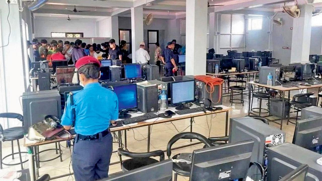 The police during the raid at the Thamel call centre in Nepal capital