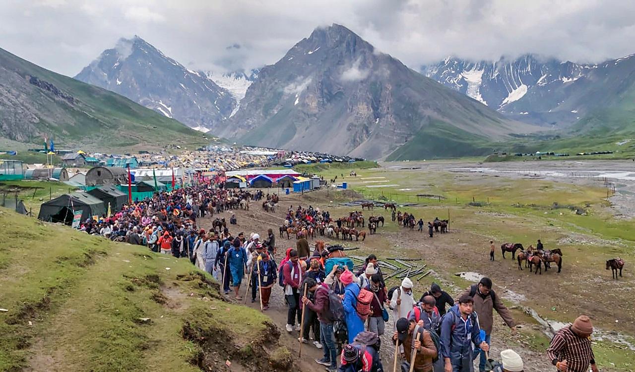 Flash flood near the cave shrine on Friday killed 16 people and injured 37 while 15,000 were rescued. Pic/PTI