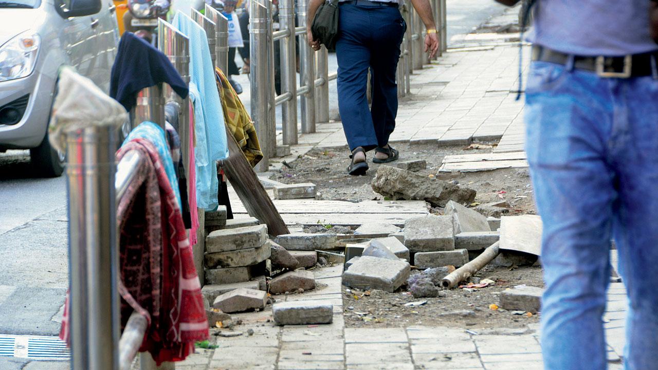 Paver blocks have come off a footpath at Worli. File pic