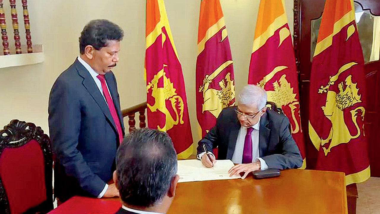 Sri Lankan Prime Minister Ranil Wickremesinghe takes oath as acting President after Parliament Speaker Mahinda Yapa Abeywardena accepted the resignation sent by President Gotabaya Rajapaksa. Pic/ANI
