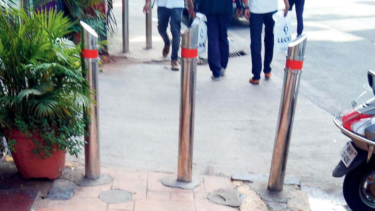 Bollards have been installed to ensure that bikes don’t enter the footpath on this stretch in Colaba 