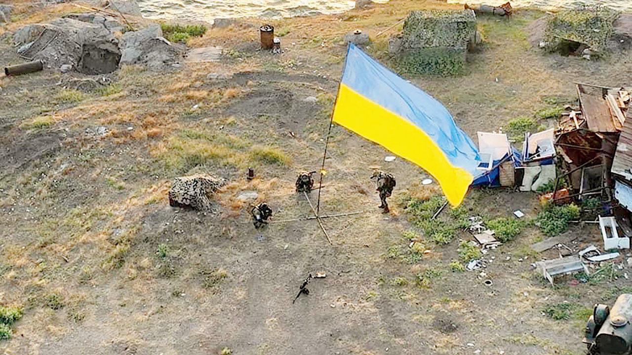 Ukraine raises flag on recaptured island