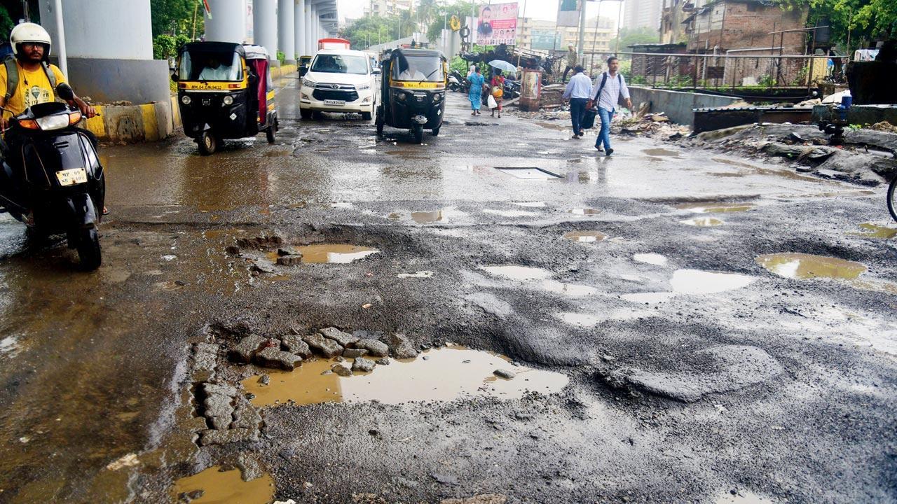 Mumbai: Commuters furious about potholes on New Link Road 