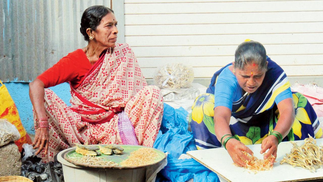 Two Koli women prepare to sell fish in Worli. Pic courtesy/Anita Yewale
