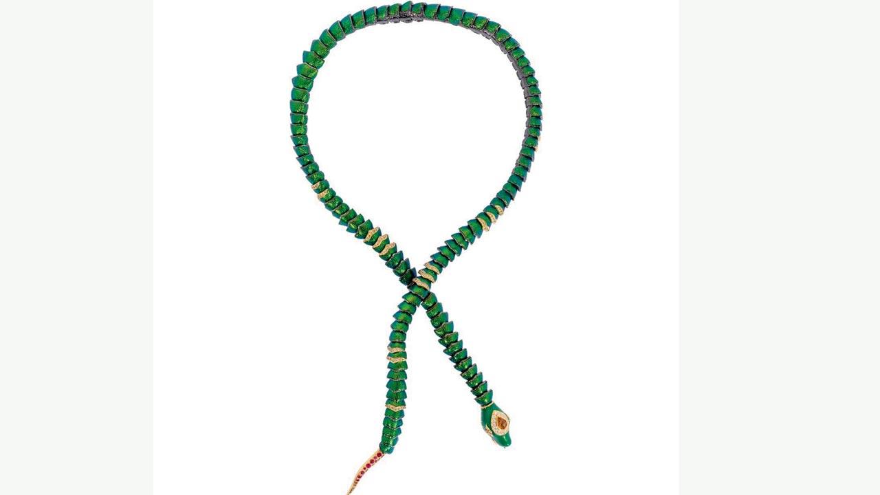 Scarab wings, such as the ones used to make this necklace, remain vivid for a long time