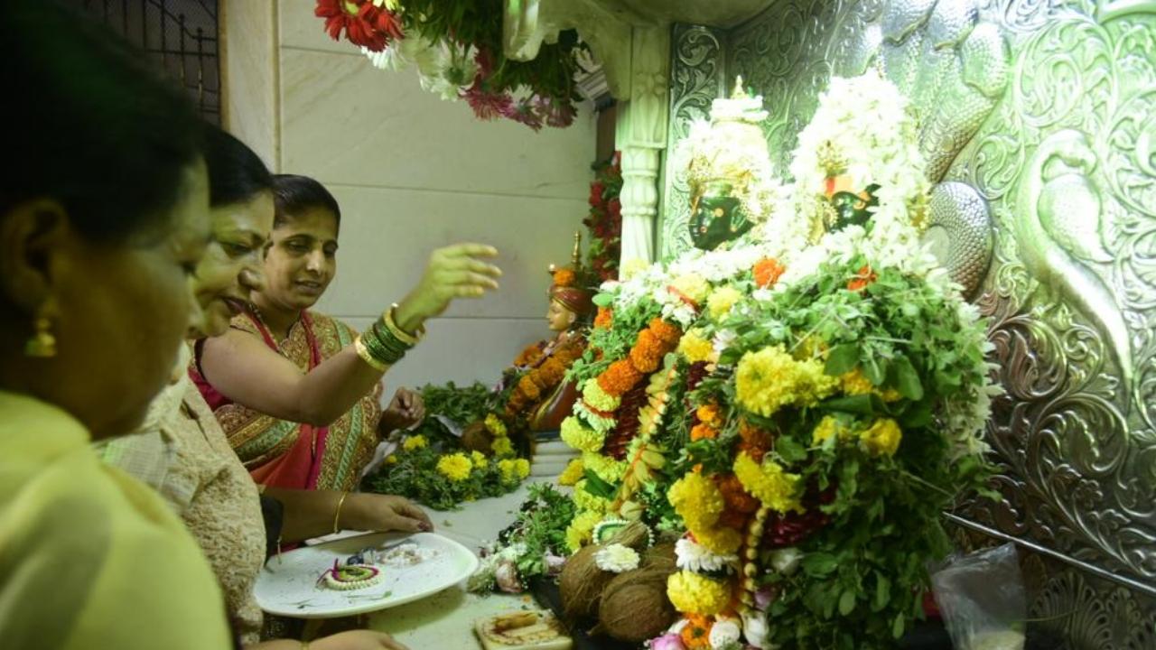 Devotees offer prayer at Vitthal Rukhmai Mandir in Bandra