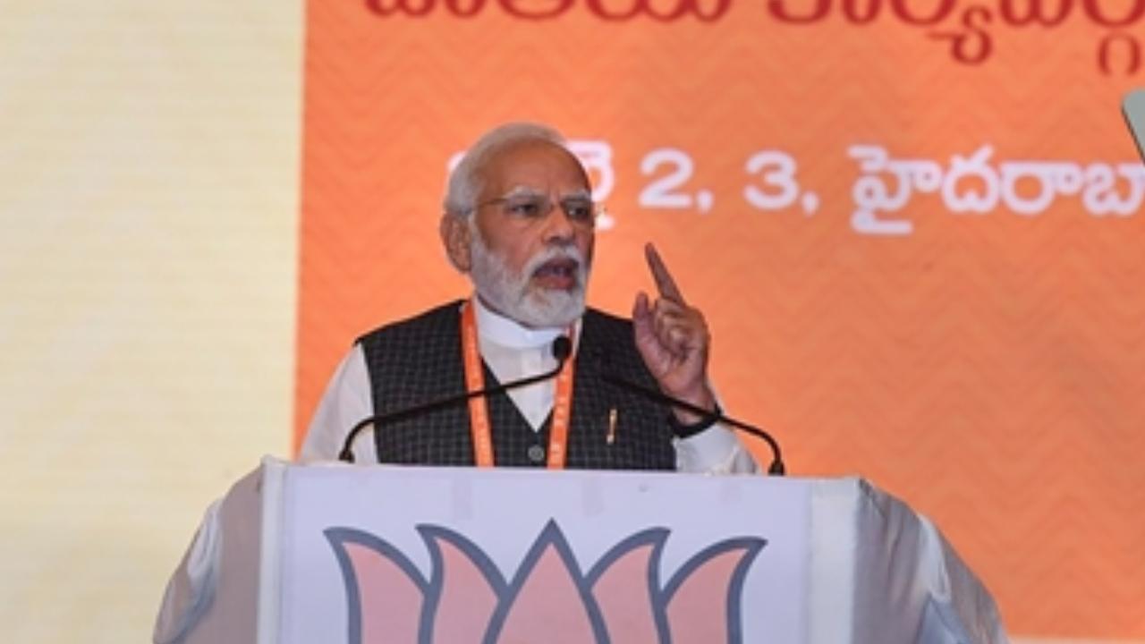 Prime Minister Narendra Modi addresses the concluding session of the BJP`s National Executive meeting, in Hyderabad. Pic/PTI
