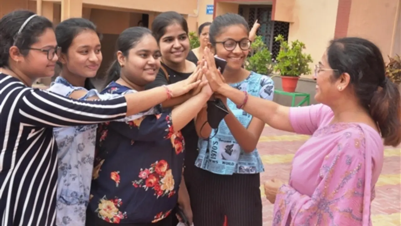 Students celebrate their success after the announcement of Central Board of Secondary Education (CBSE) Class 12th exam results, at a school in Moradabad. Pic/PTI
