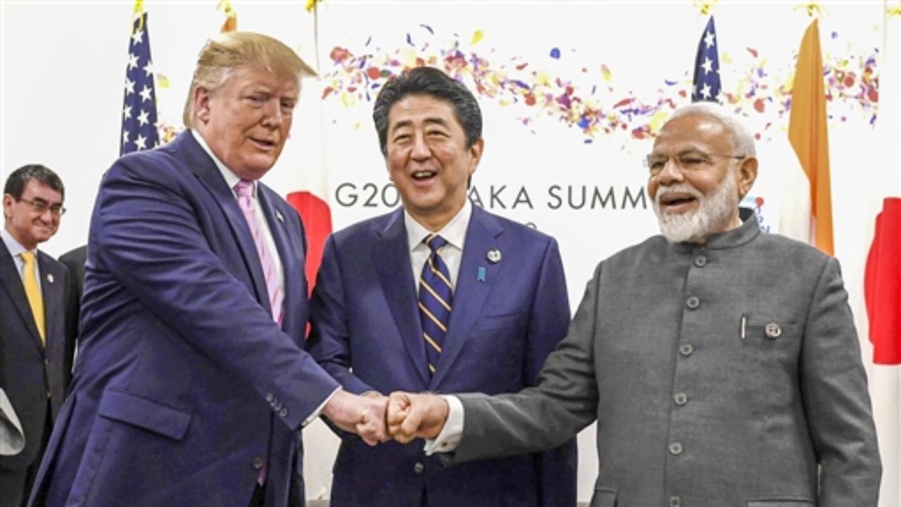 Prime Minister Narendra Modi with then Japan PM Shinzo Abe and then US President Donald Trump in Osaka, Japan. The former PM Shinzo Abe has died after being shot during a campaign speech, on Friday, July 8, 2022. Pic/PTI 