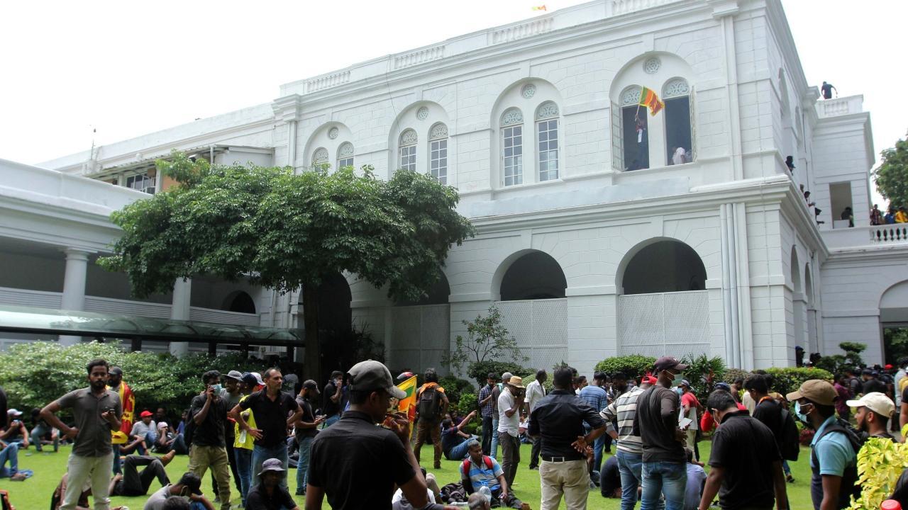 Sri Lanka leader flees as protesters storm home, office