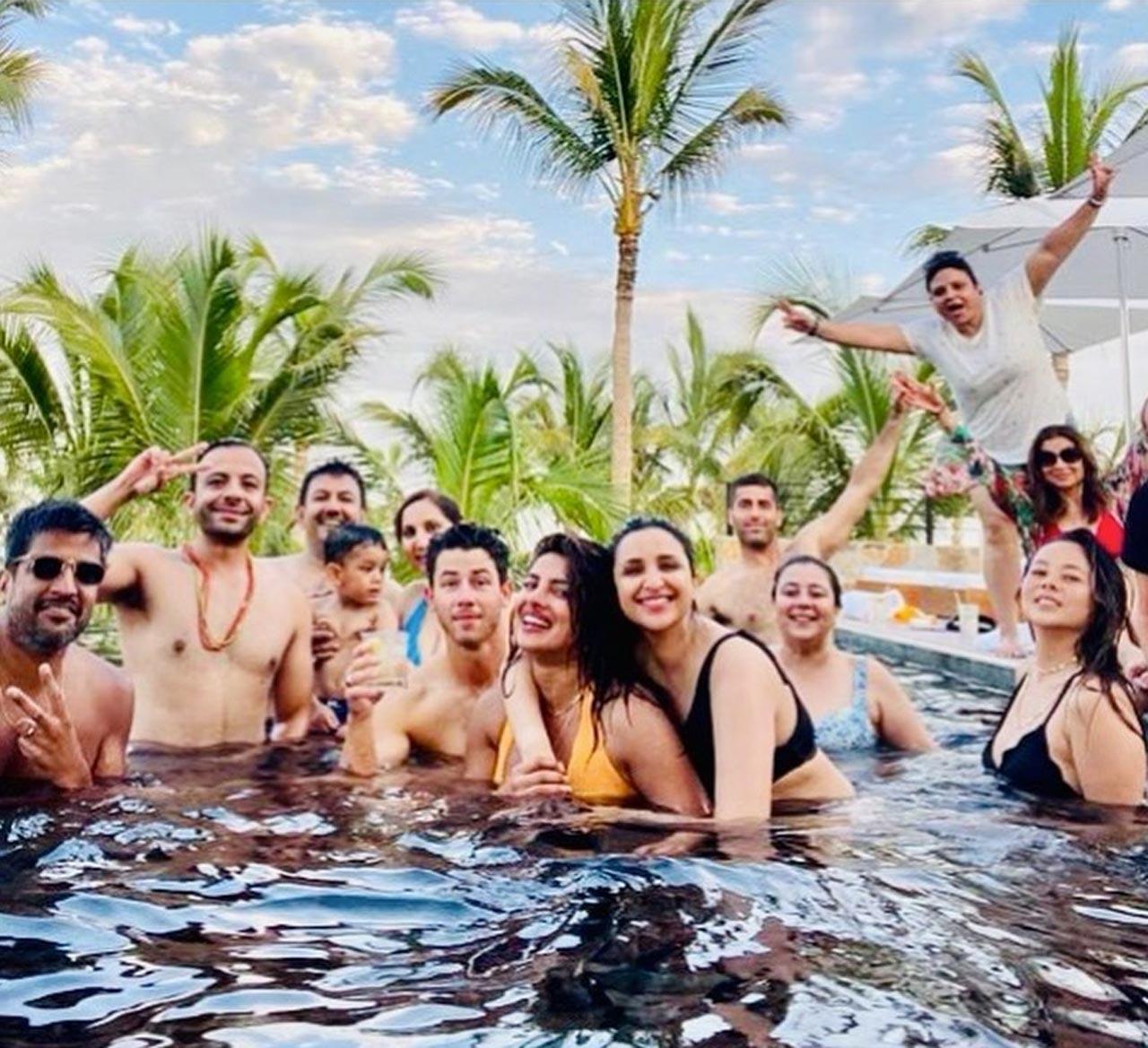 In one of the pictures, Priyanka, Nick and Parineeti are seen having fun in a pool with their friends. One of the pictures showed Parineeti sitting near a fireplace with Priyanka and others