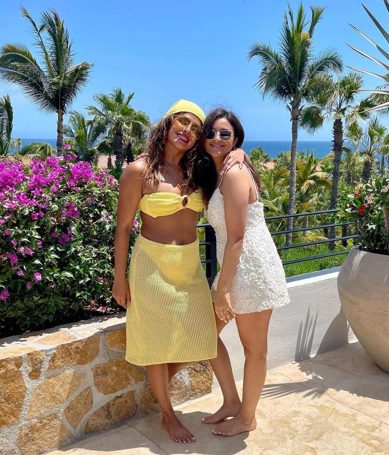 In the spirit of being at the beachside, Priyanka dazzled in a yellow coordinated set while Parineeti sported a short white strappy dress. For the evening bash, Priyanka chose a royal blue thigh-high slit gown and Parineeti slayed in a shimmery short dress