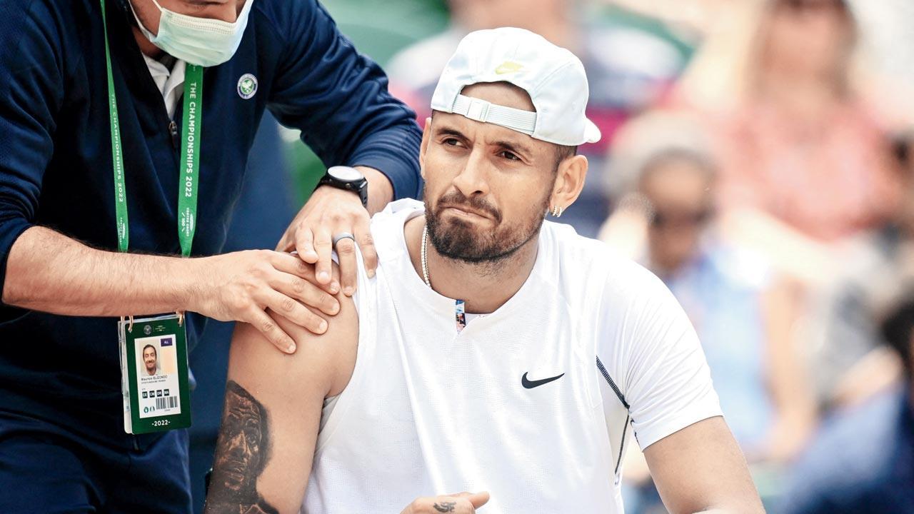 Wimbledon: Nick Kyrgios overcomes shoulder injury to reach quarters