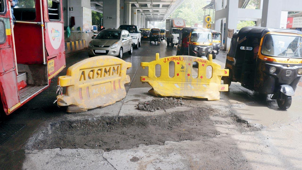A big pothole near Oshiwara bus depot, on Saturday
