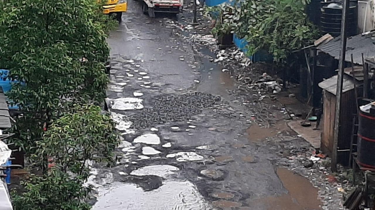 According to PTI, BMC has received over 10,340 complaints regarding potholes. Pic/Satej Shinde