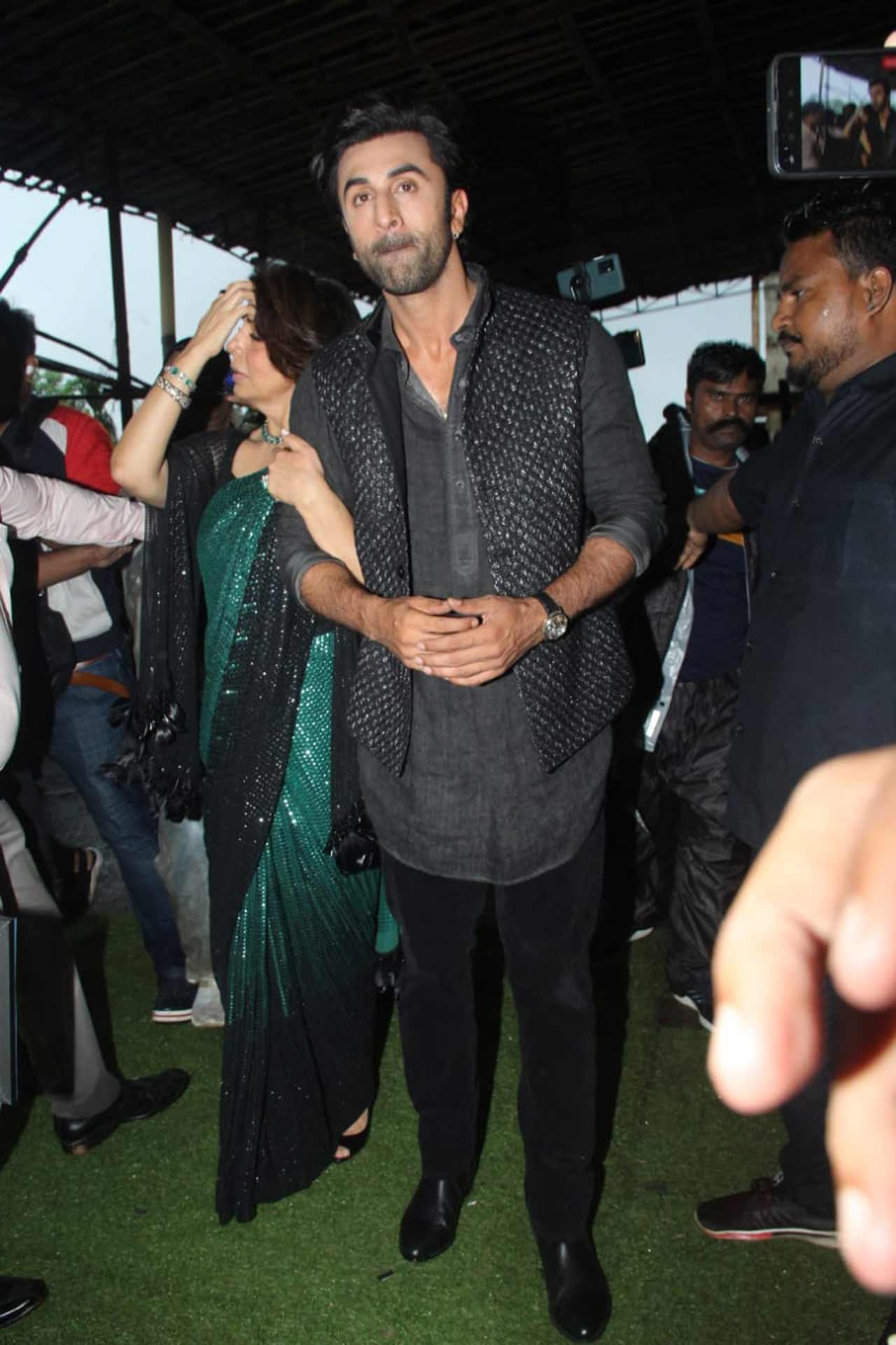 The promotional event for the film has already started. This time, Ranbir, along with his co-star Vaani Kapoor, attended the dance reality show - Dance Deewane Juniors, to promote the movie. While Ranbir opted for a black sherwani, his mom Neetu Kapoor stunned in a sequin ombre saree