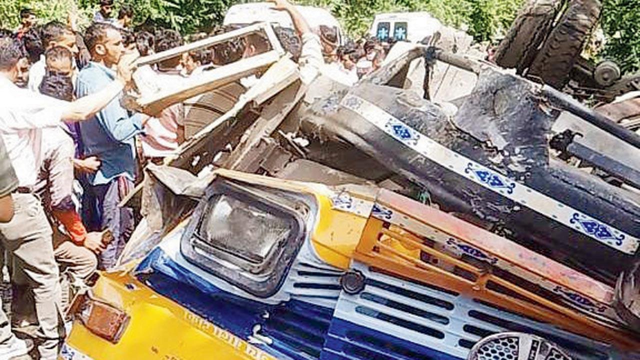 The wrecked remains of the private bus. Pics/ANI