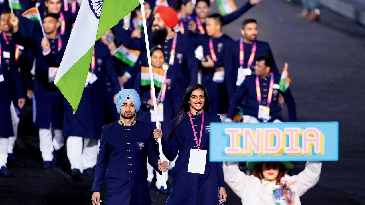 India’s joint flagbearers Manpreet Singh and PV Sindhu during the opening ceremony at Birmingham on Thursday. Pic/Getty Images