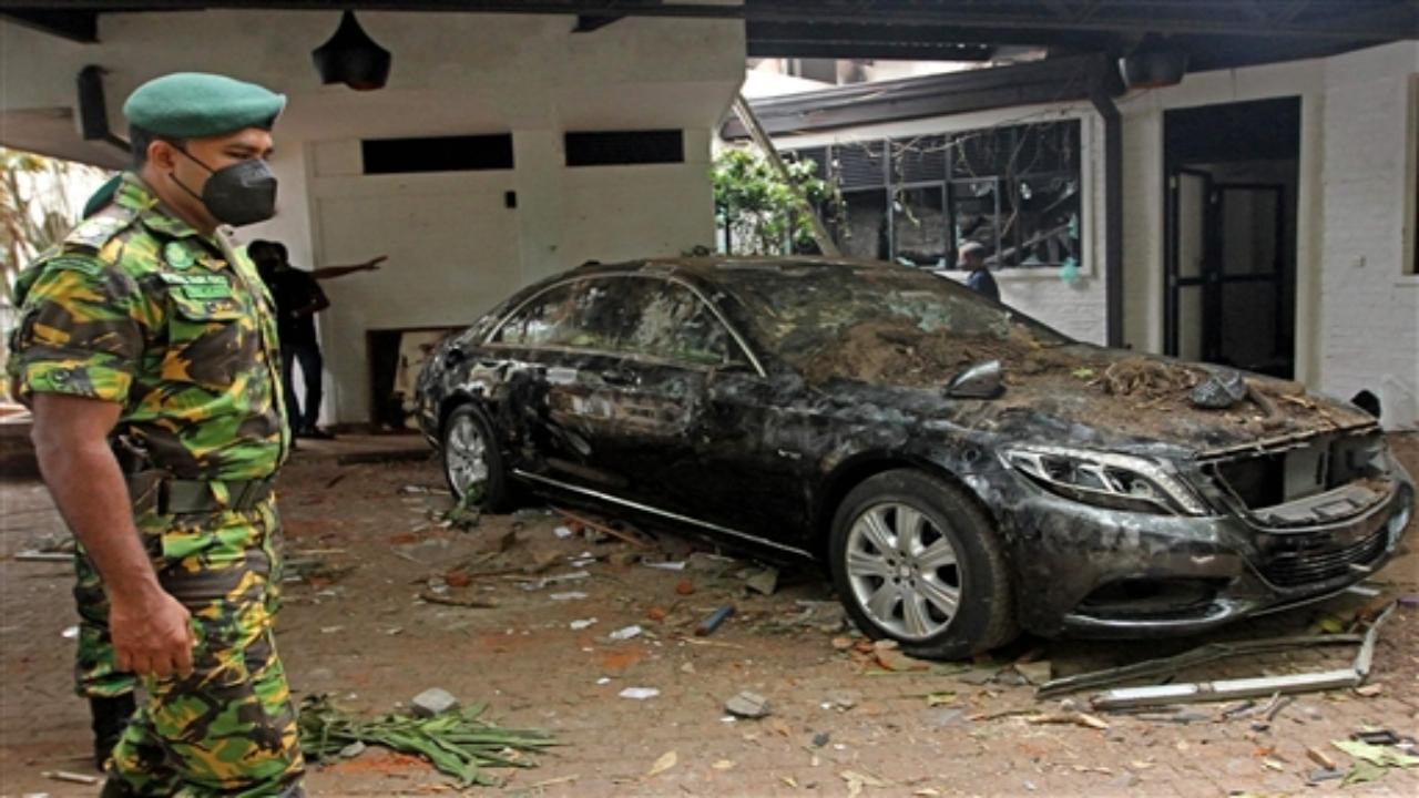 Mangled remains of a vehicle inside the residence of Sri Lanka's Prime Minister, a day after it was vandalised by the protestors in Colombo