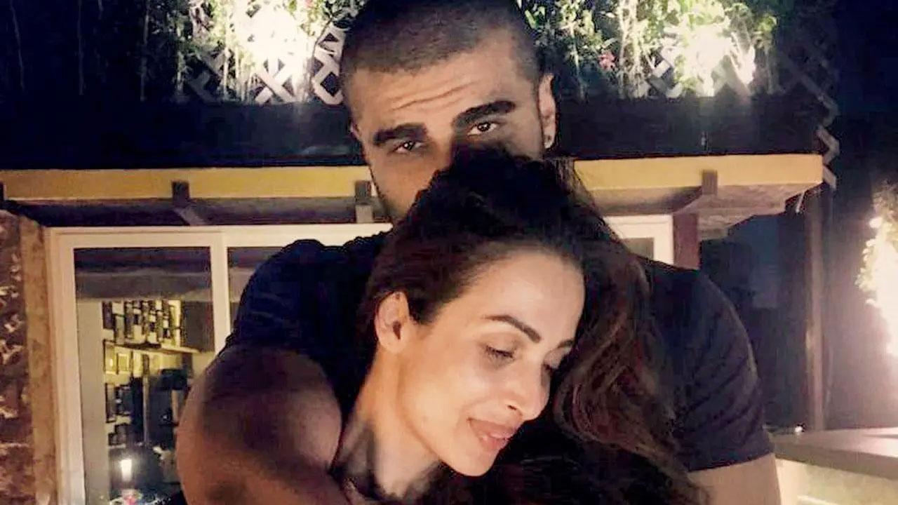 Malaika Arora steals Arjun Kapoor's jumper, check out the video!