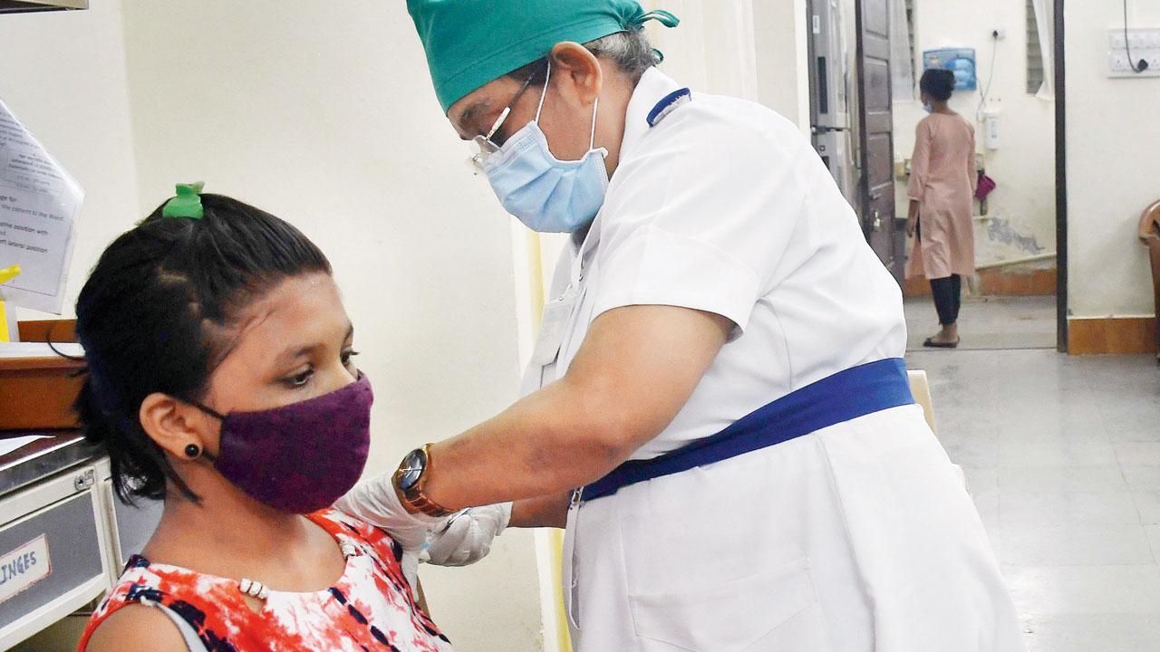 A youngster gets a dose of vaccine at BYL Nair Hospital. File pic