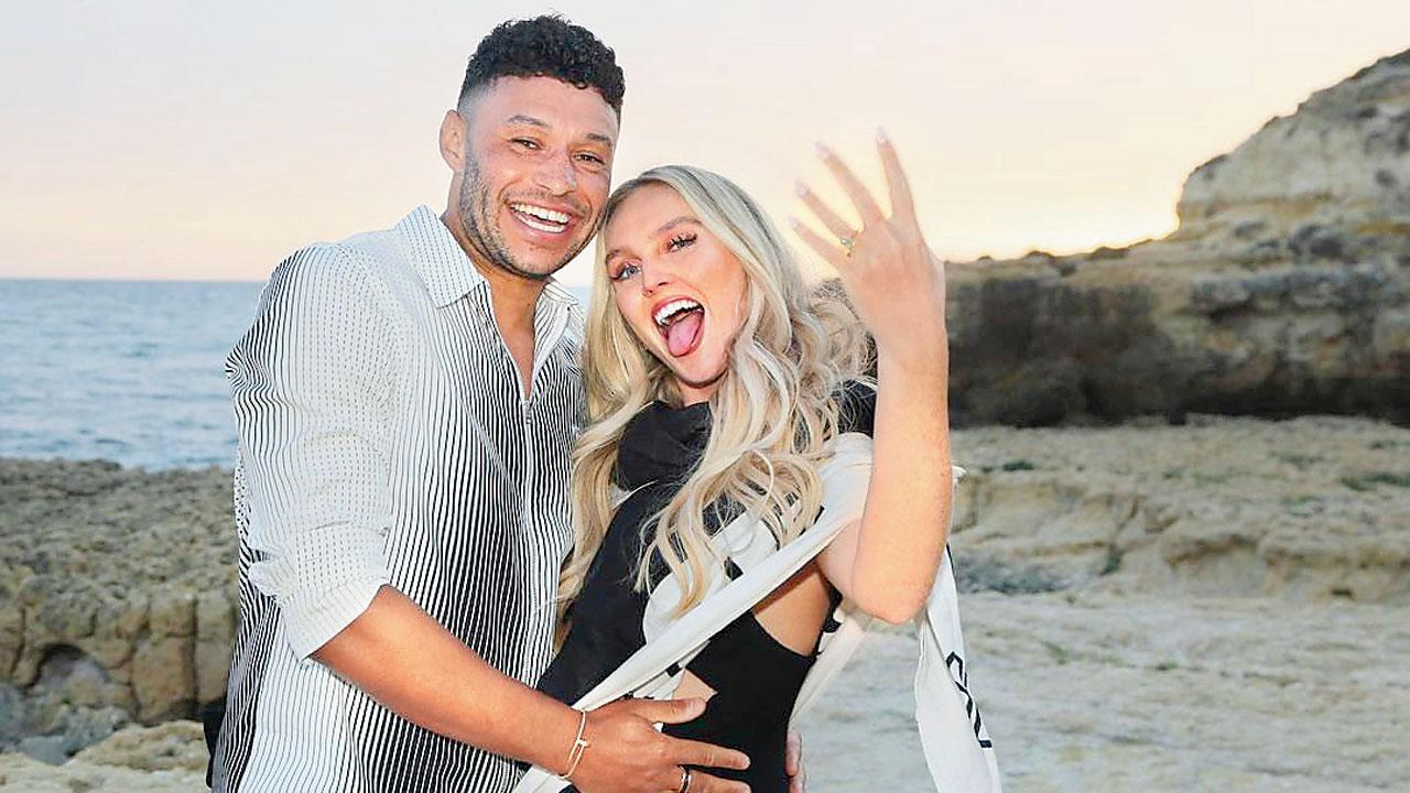 Singer Perrie Edwards says yes to Liverpool football player Alex Oxlade-Chamberlain 