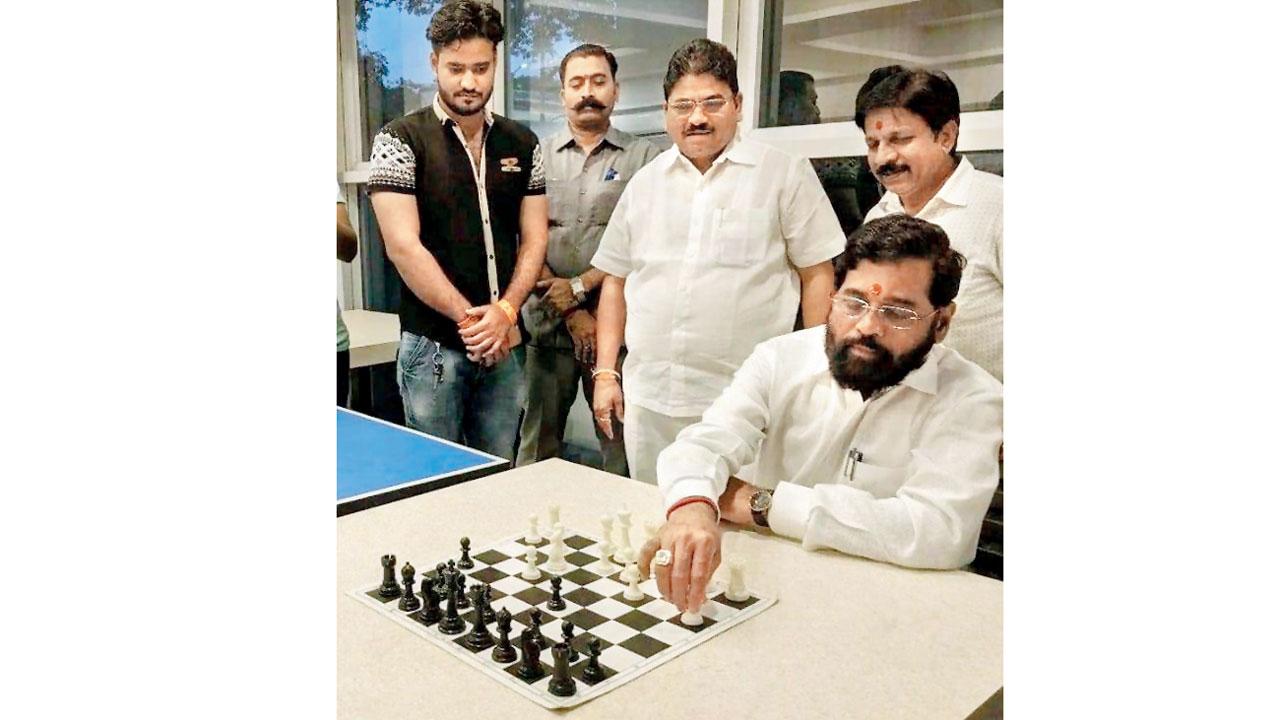 Eknath Shinde plays chess at a hotel in Guwahati, on Thursday. Pic/ANI