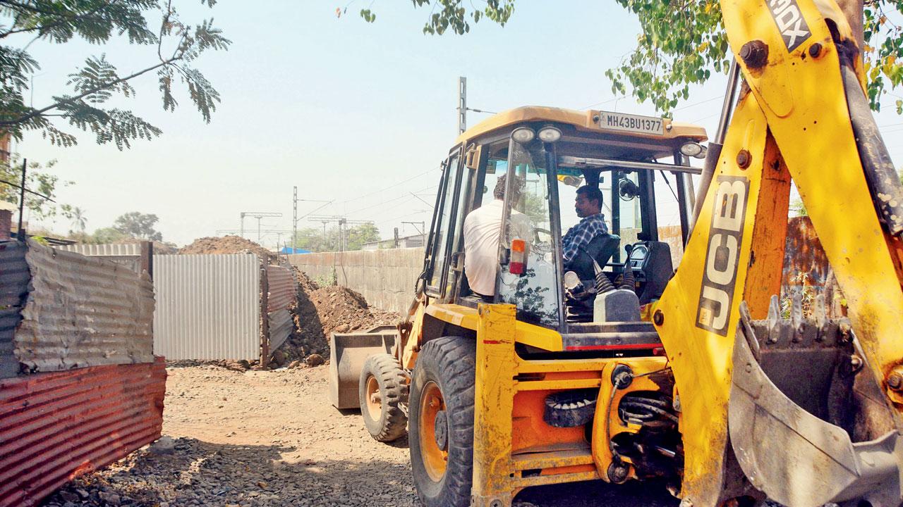 A JCB near the lake in February