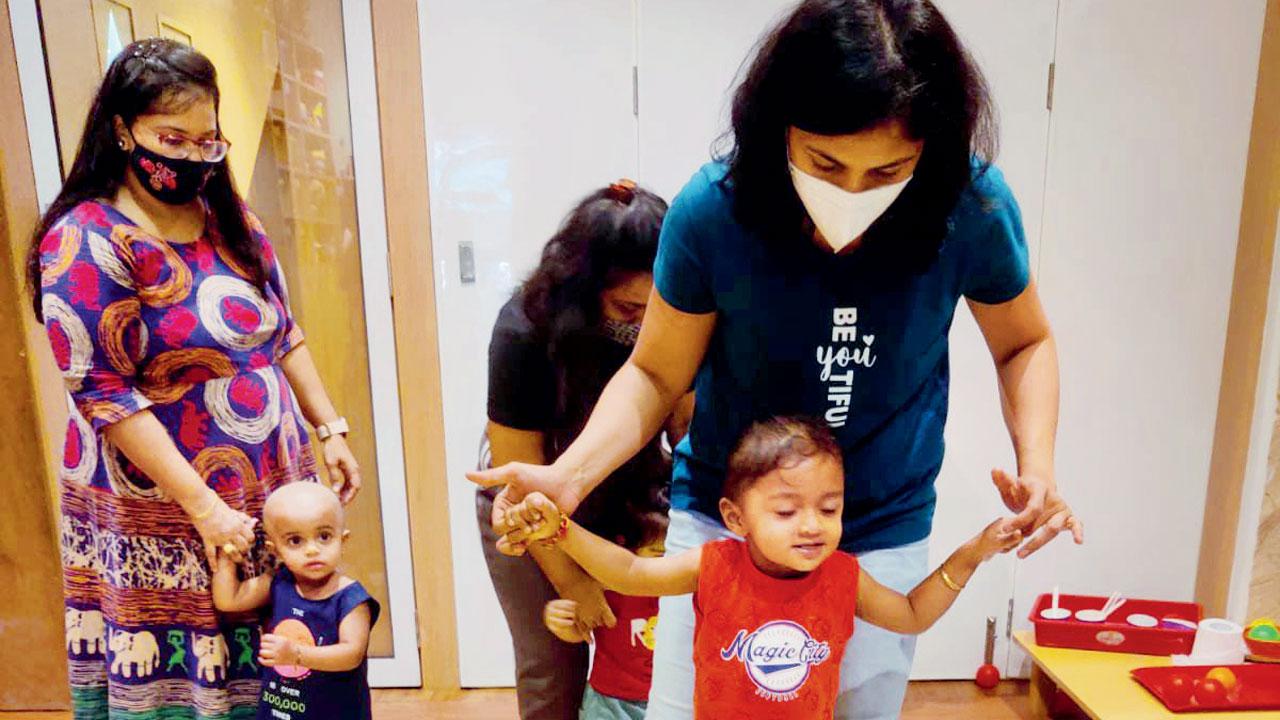 Moms with their toddlers during a Mommy and Me workshop
