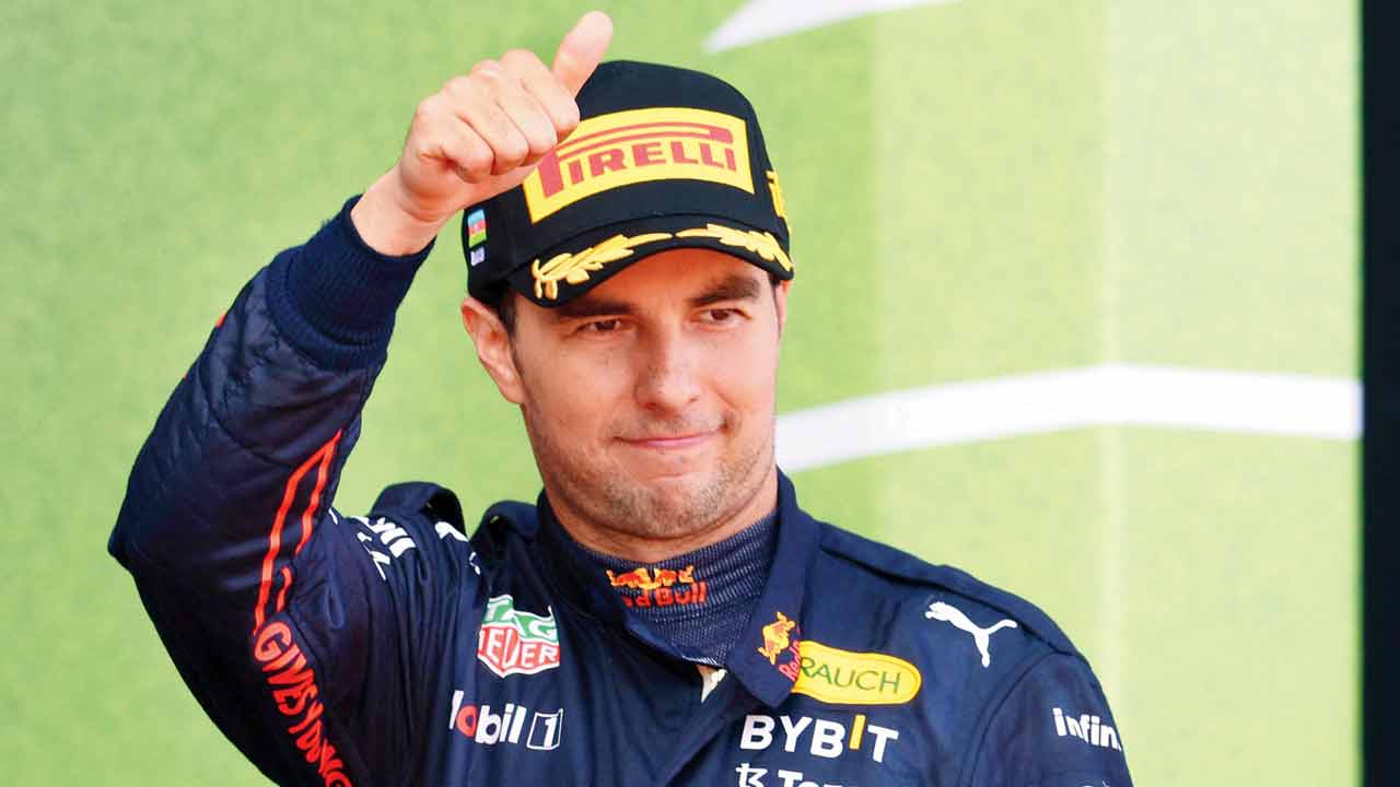 Second-placed Sergio Perez acknowledges the crowd