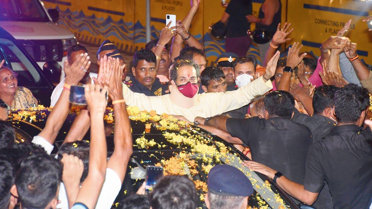 Uddhav Thackeray is greeted by Sena workers, on the Bandra-Worli Sea Link on Wednesday. Pic/Ashish Raje