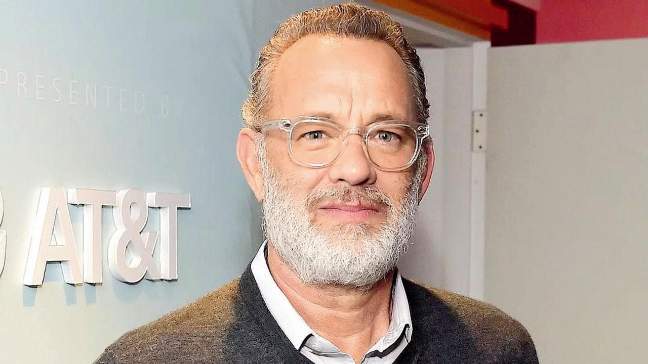 Tom Hanks loses cool at fans as wife Rita Wilson nearly trips and falls