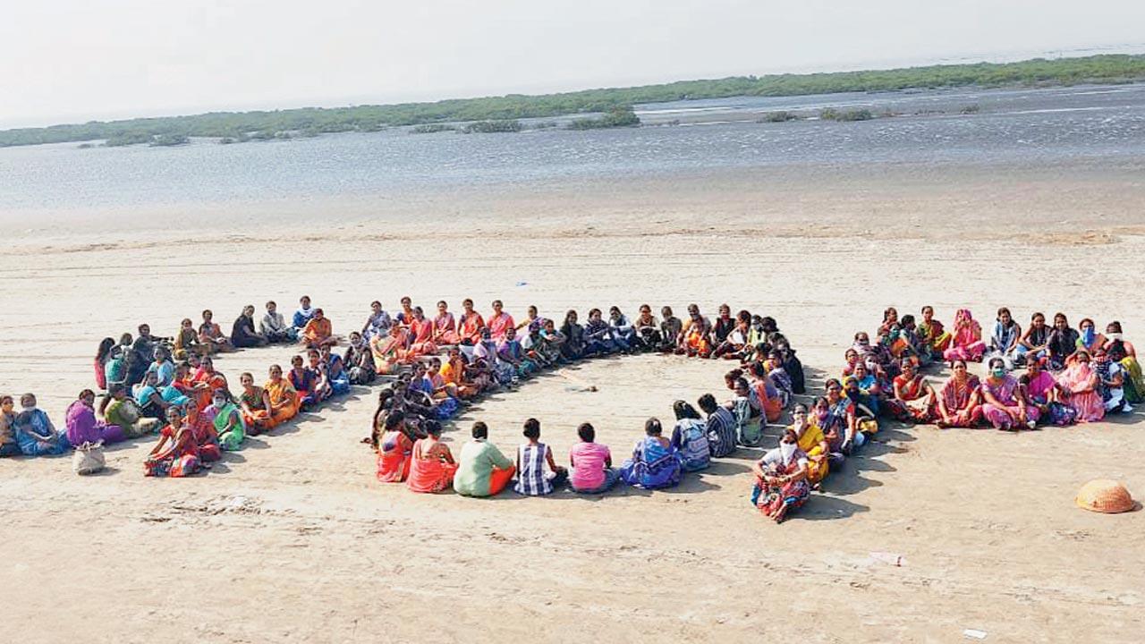 Villagers seen protesting against the construction of the port in Vadhavan. Local fishermen say that if 5,000 acres of land is reclaimed from the sea to build the port, it would completely cut them off their livelihood, and also make the region flood-prone