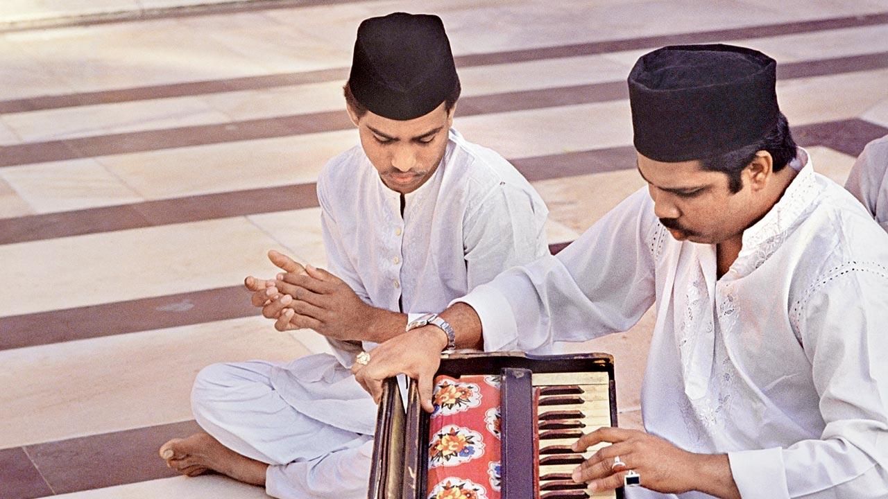 Qawwals at the shrine of Sufi saint Nizamuddin Auliya in Delhi.  The harmonium has become the main and only instrument of the qawwali.  Gradually it gained a reputation as a devotional musical instrument in four traditions.  Photo/Getty Images
