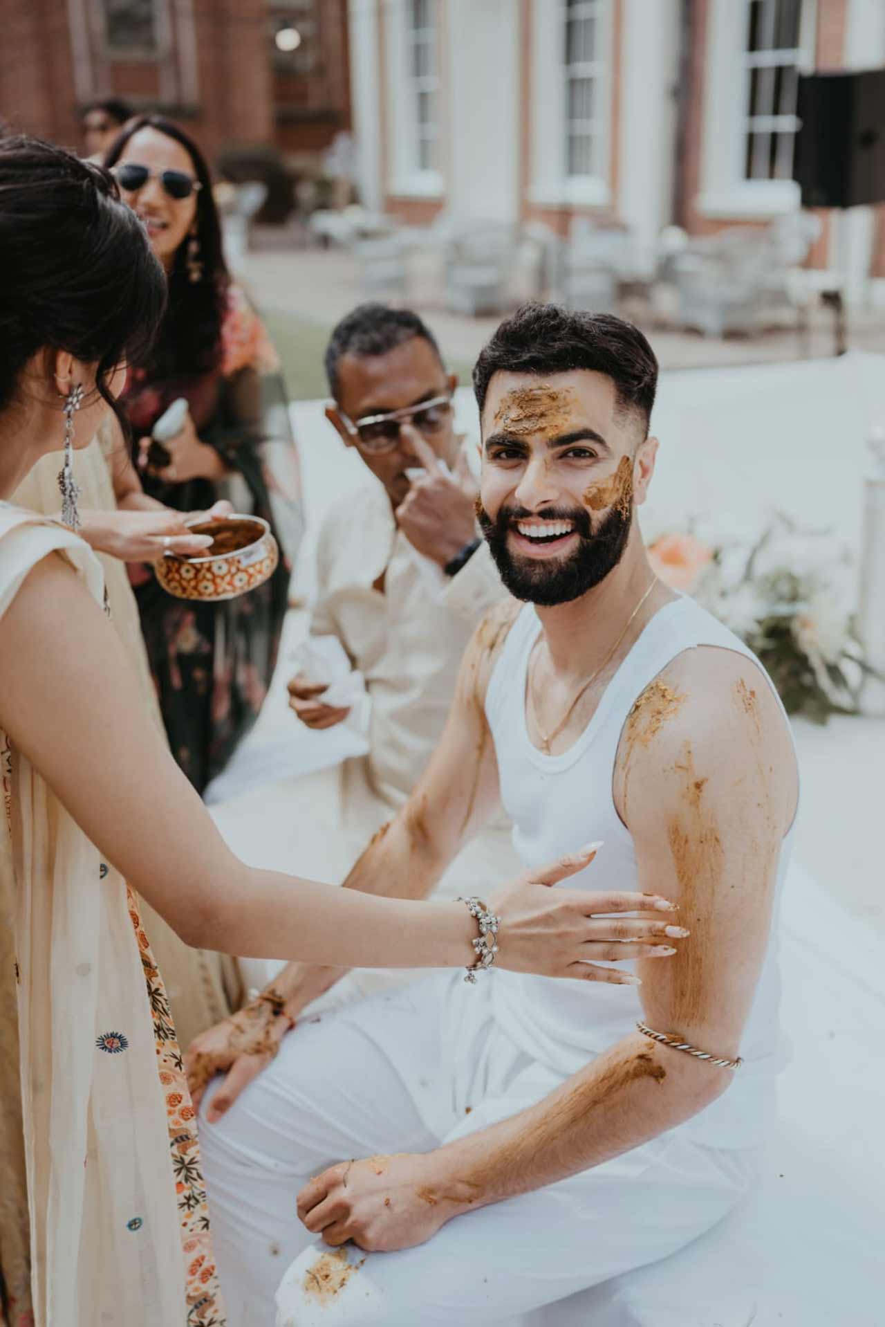 For the Haldi ceremony, Ankur Rathee decided to keep it minimal with a white vest and a white pyjama
