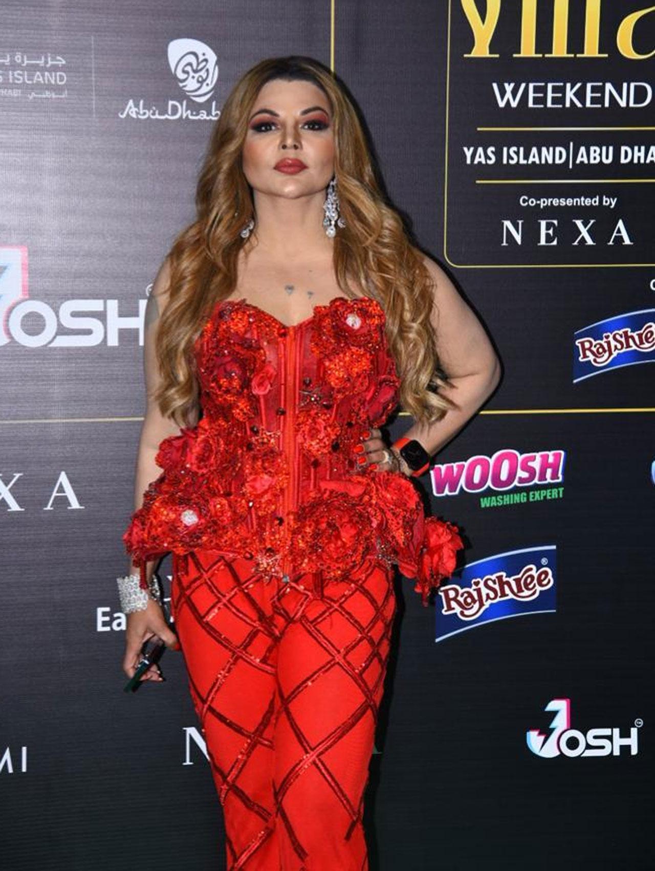Rakhi Sawant was also spotted at the green carpet in a red dress
