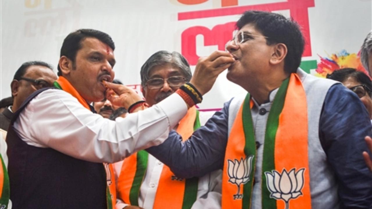 Former Maharashtra CM Devendra Fadnavis with winning BJP candidate Piyush Goyal, after three members were elected as Rajya Sabha member, in Mumbai